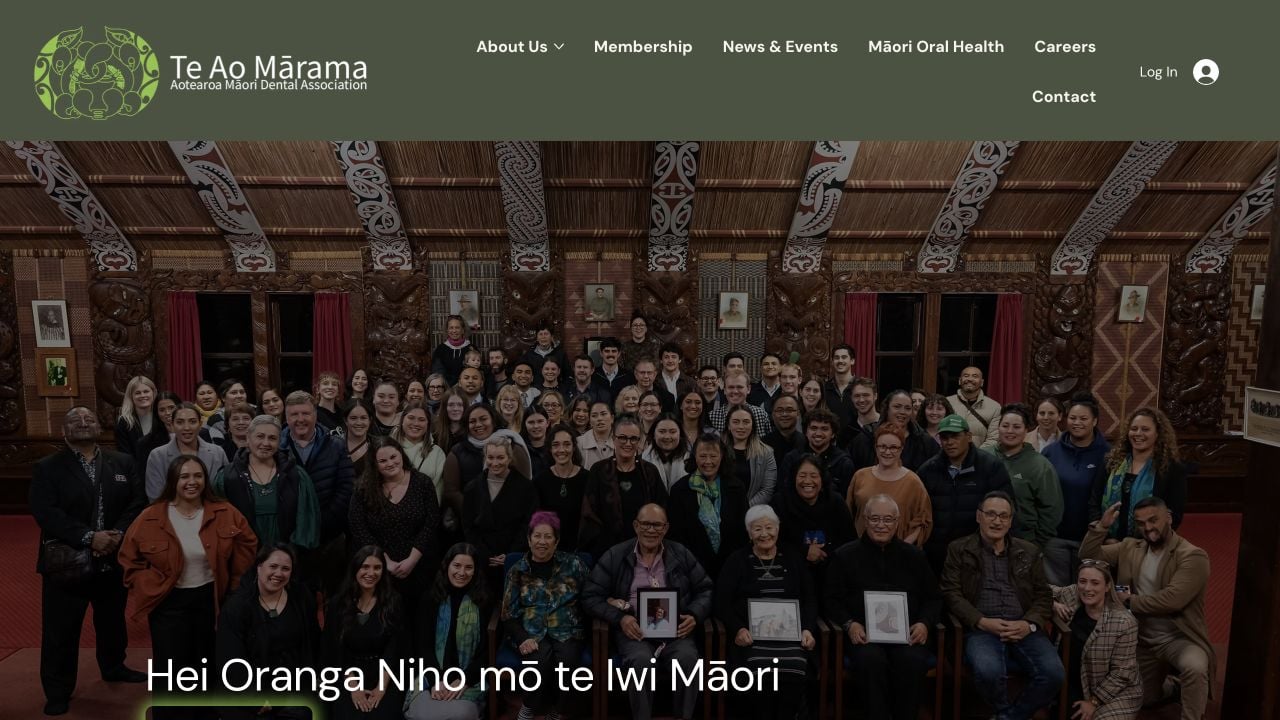 Te Ao Mārama website showing the association identity, membership navigation and a photograph of its community gathered in a wharenui